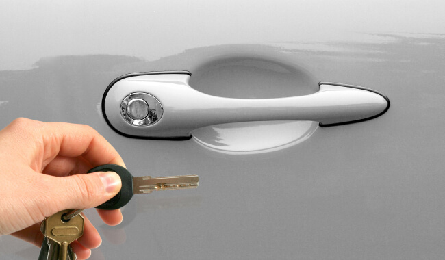 Car key replacement at a car door in Waco