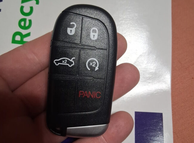 Push-to-start smart key fob programmed for a car in Dallas