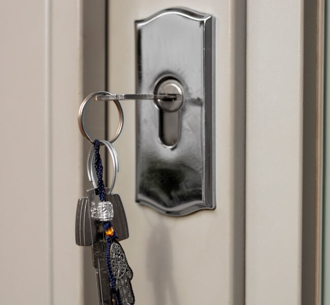 Residential lock installation with house keys in a door lock