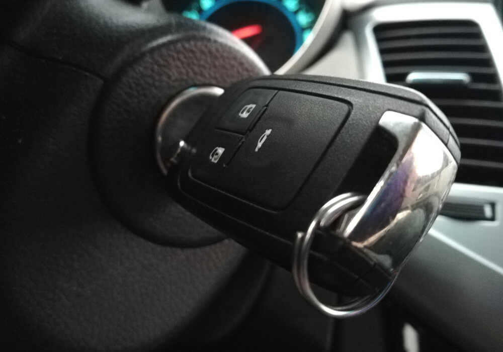 Remote head car key in the ignition with the dashboard lit